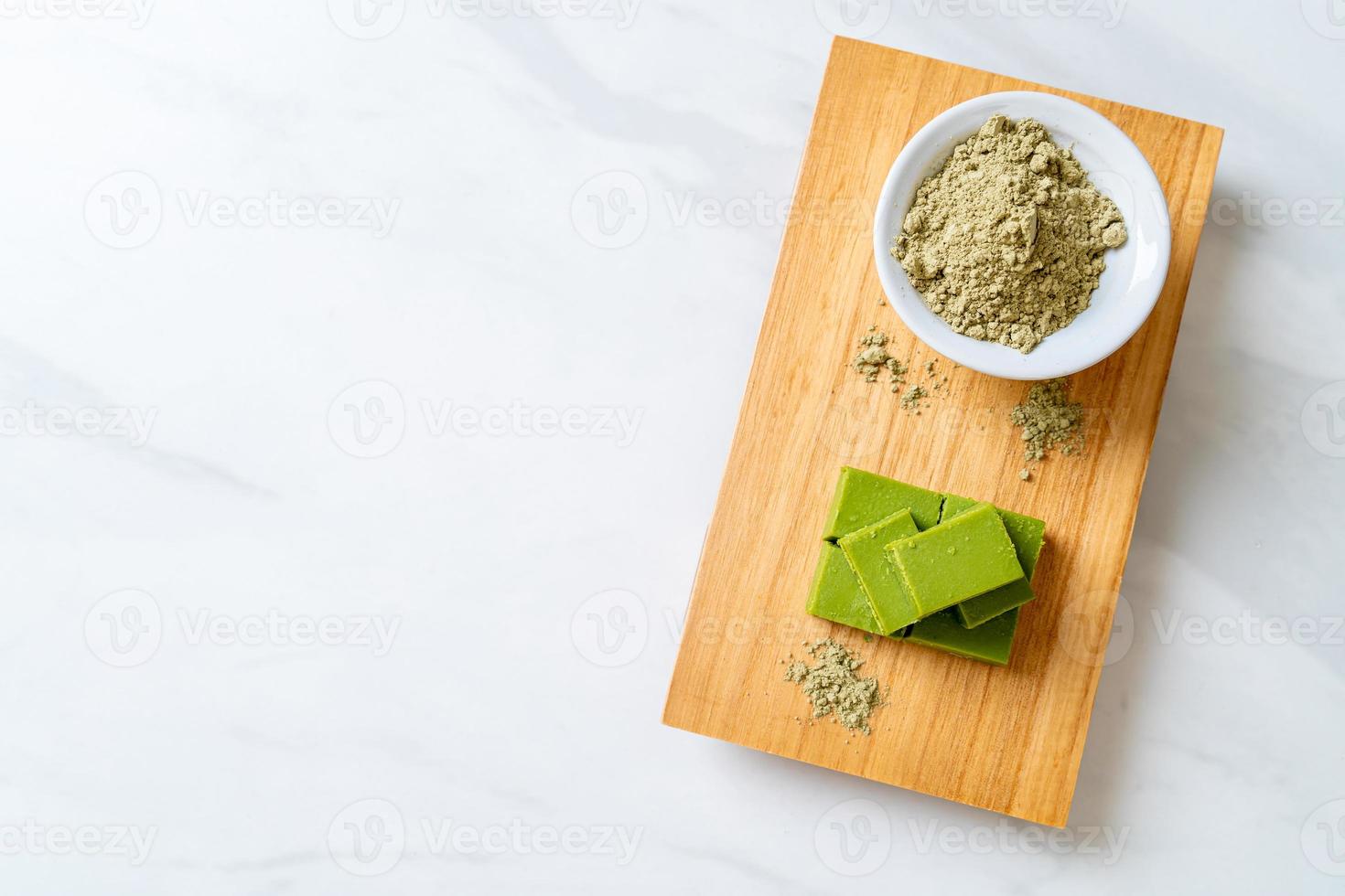 Fresh and soft matcha green tea chocolate with matcha green tea powder photo