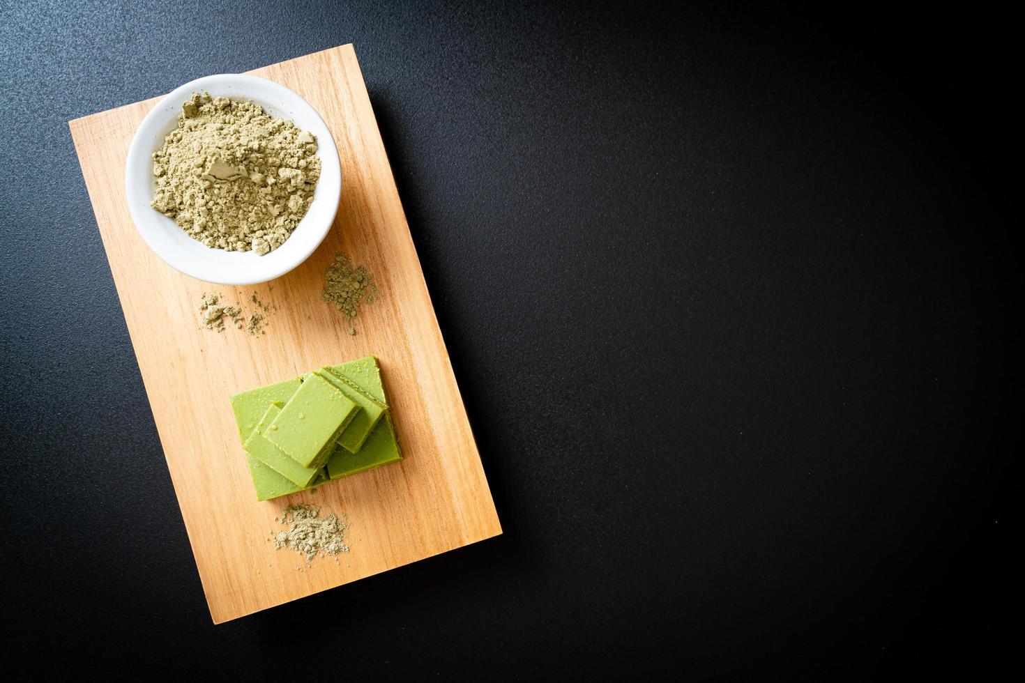 Fresh and soft matcha green tea chocolate with matcha green tea powder photo