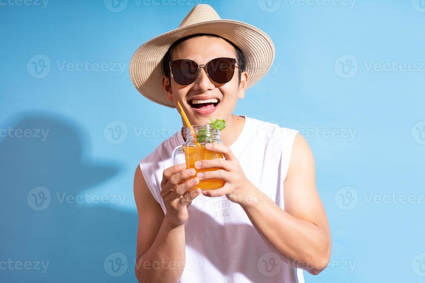 Handsome Asian man wearing sunglasses photo