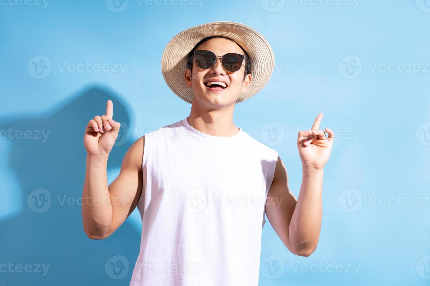 Handsome Asian man wearing sunglasses photo