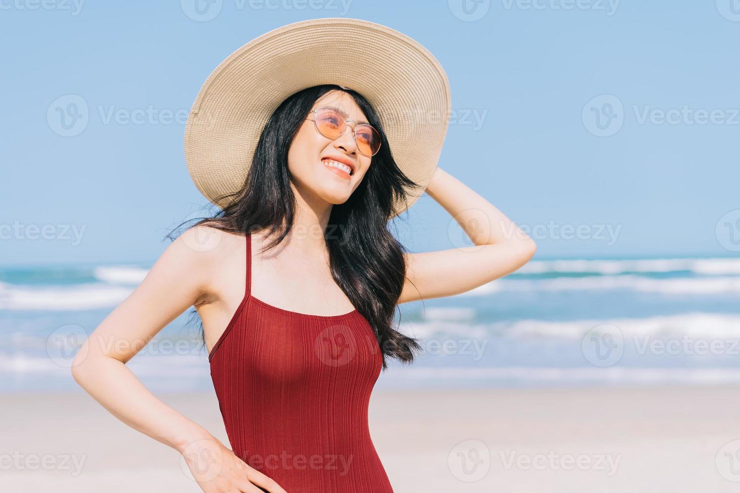 Beautiful young Asian woman in swimwear photo