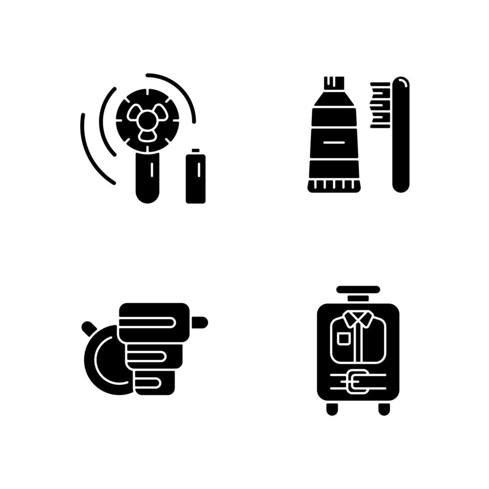 Things for travelling tourist suitcase black glyph icons set on white space. Compact fan. Toothbrush and paste. Mini size objects for tourist. Silhouette symbols. Vector isolated illustration