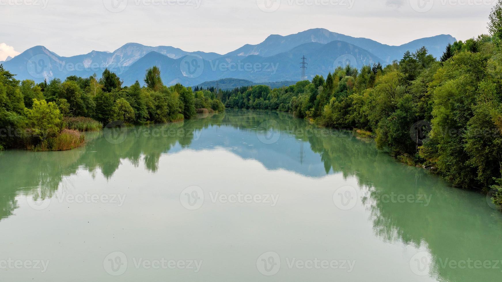 Forest and river in autumn photo