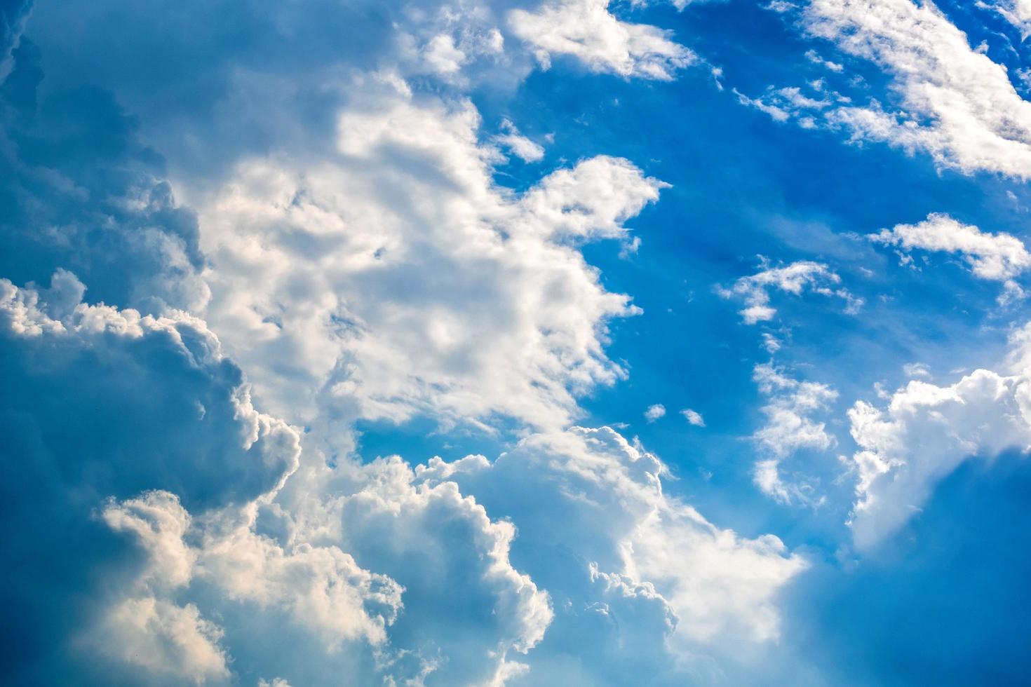 Clouds over blue sky photo