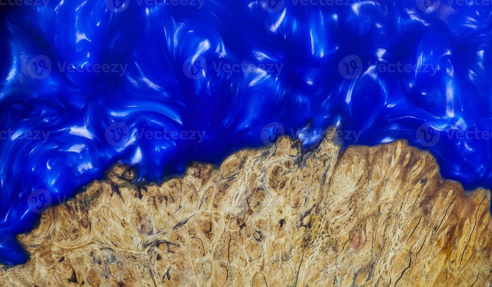 Fundición de resina epoxi padauk burl textura de fondo de madera foto