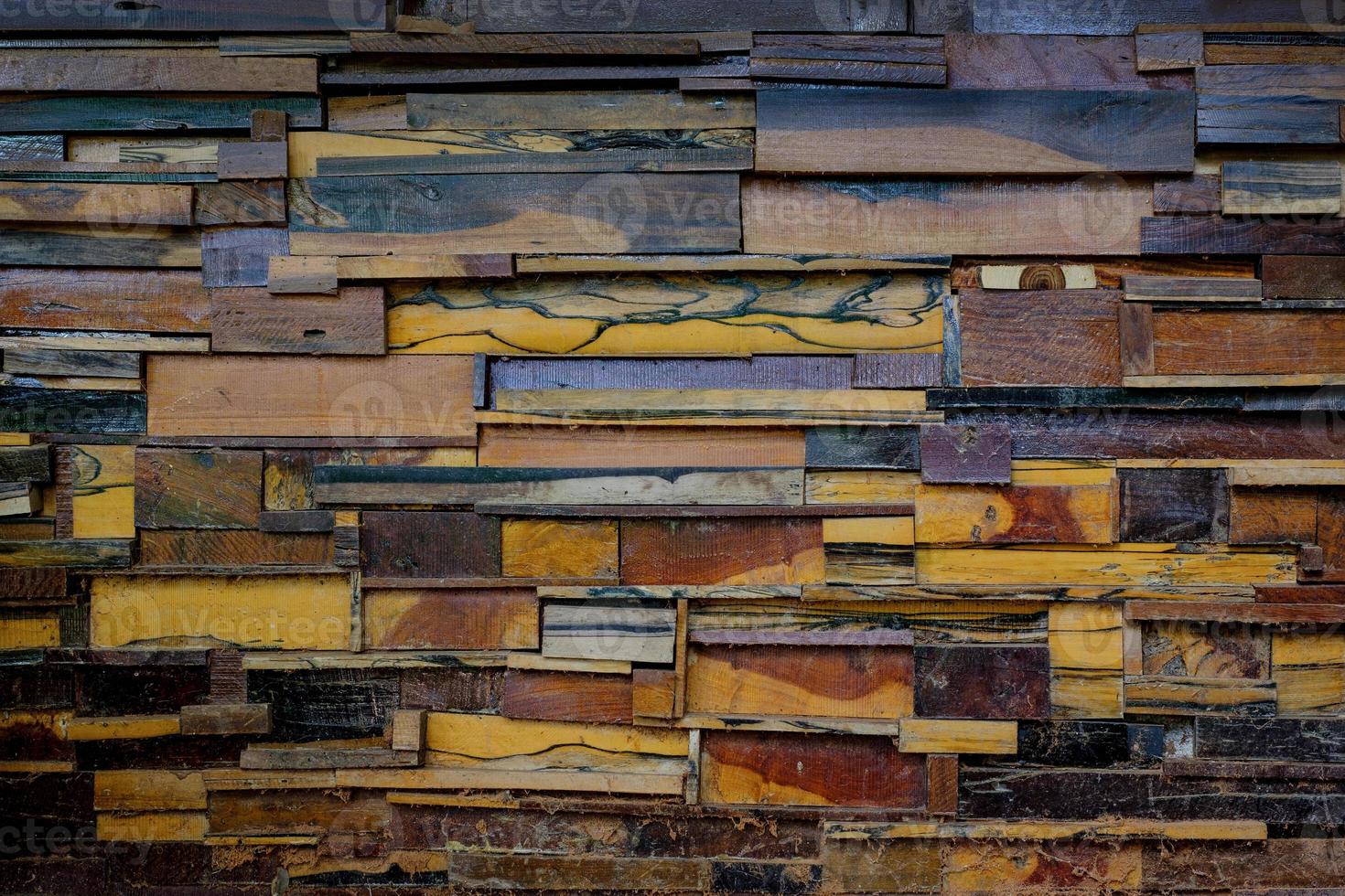 Old walls are made of different types of wood texture background photo