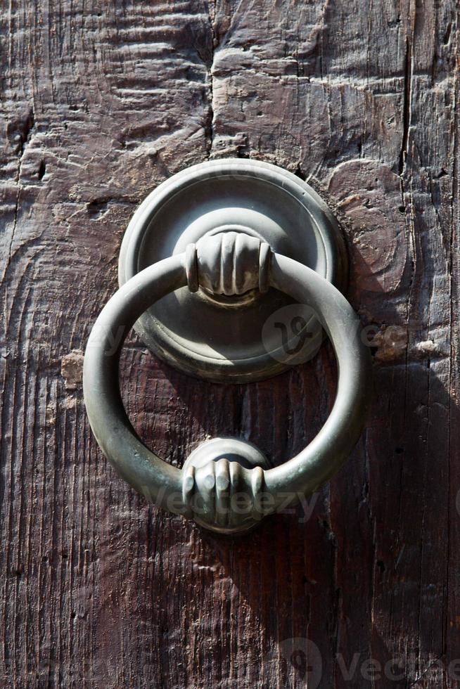 Ancient italian door knocker photo