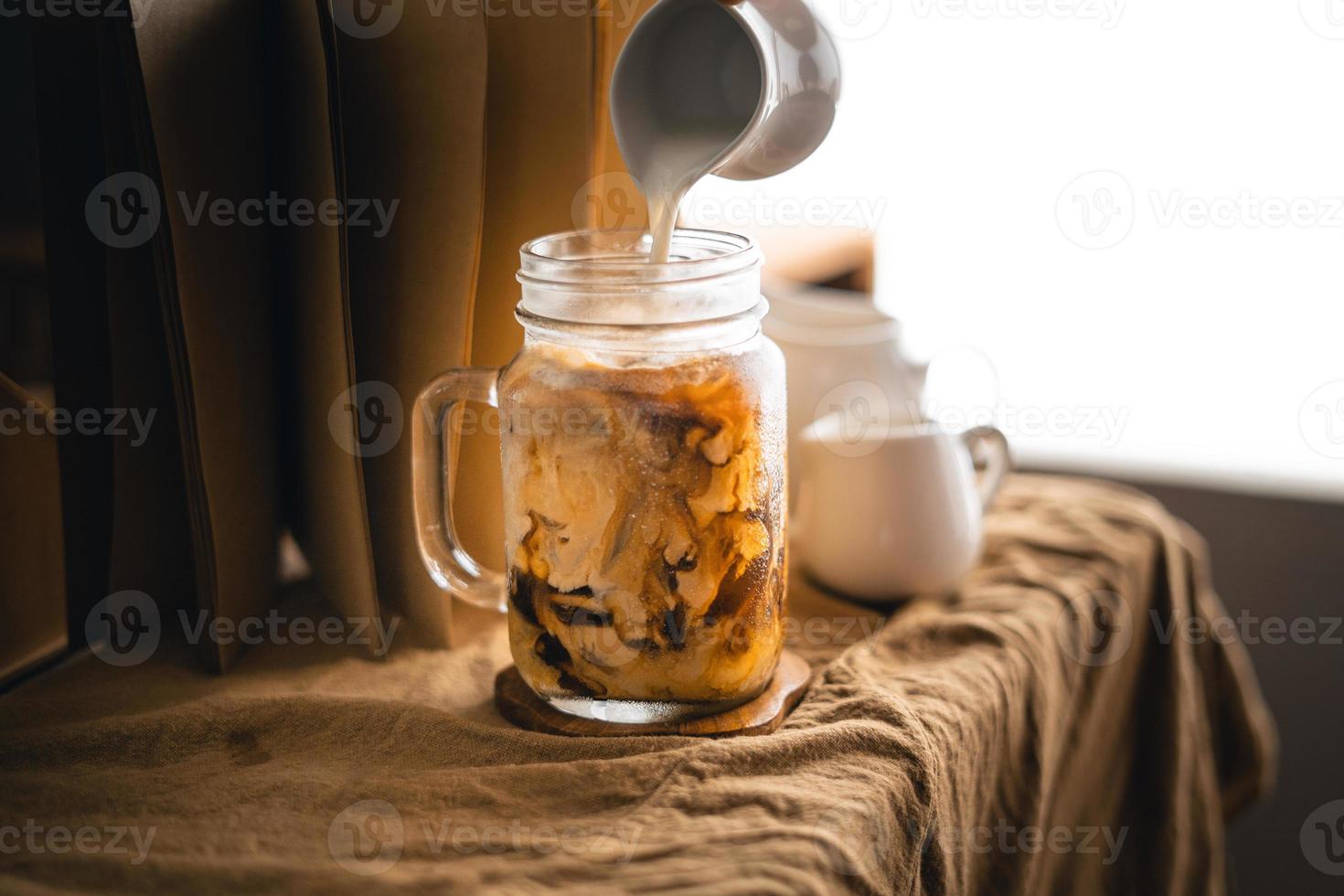 Iced coffee iced latte on table in home photo