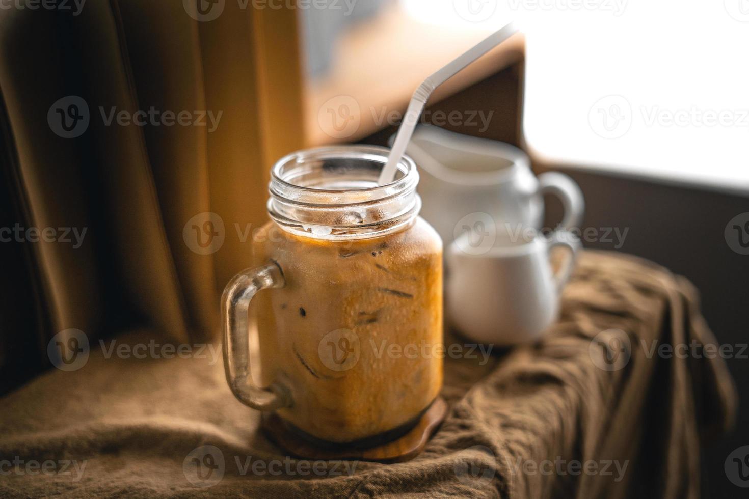 Iced coffee iced latte on table in home photo