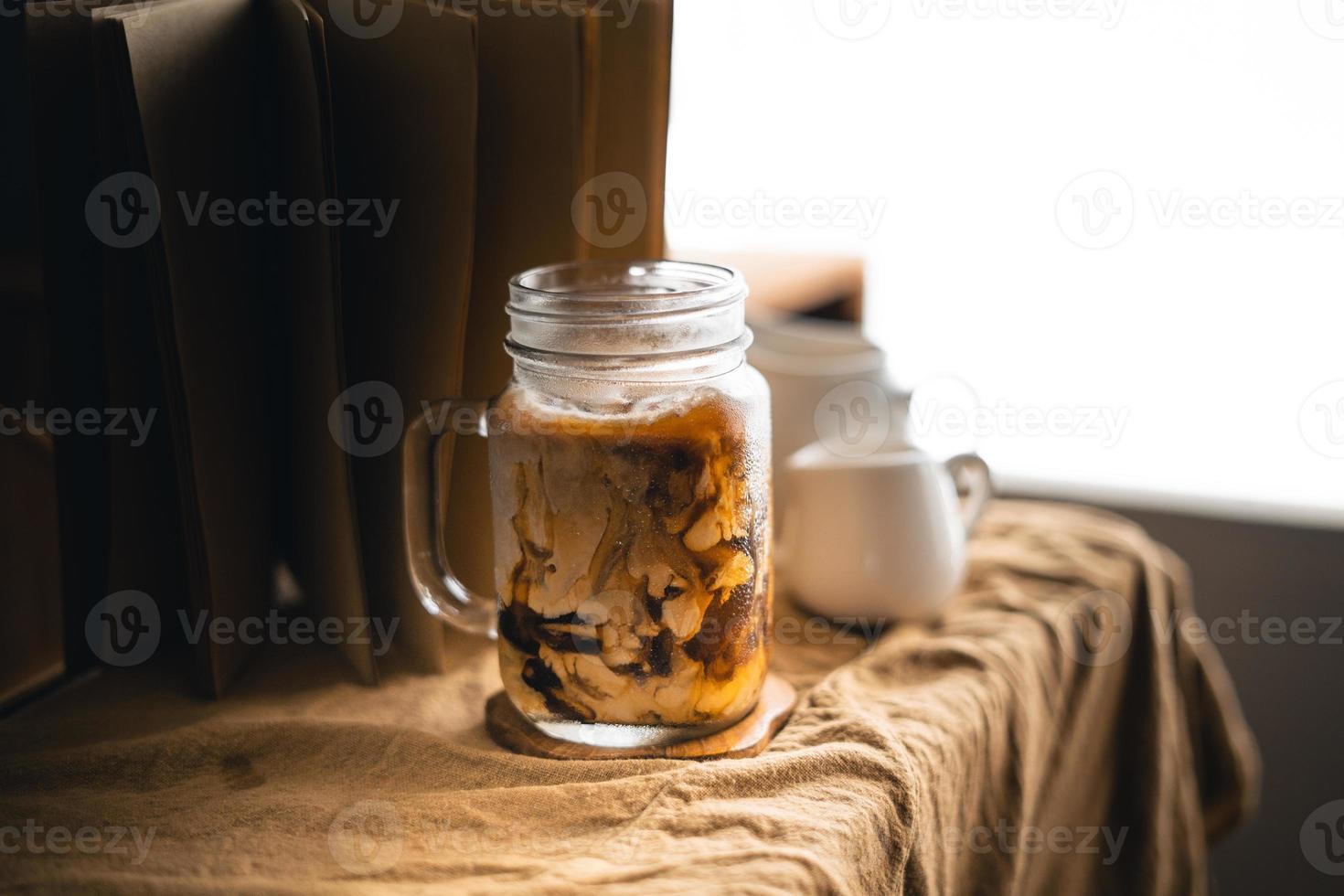 Iced coffee iced latte on table in home photo
