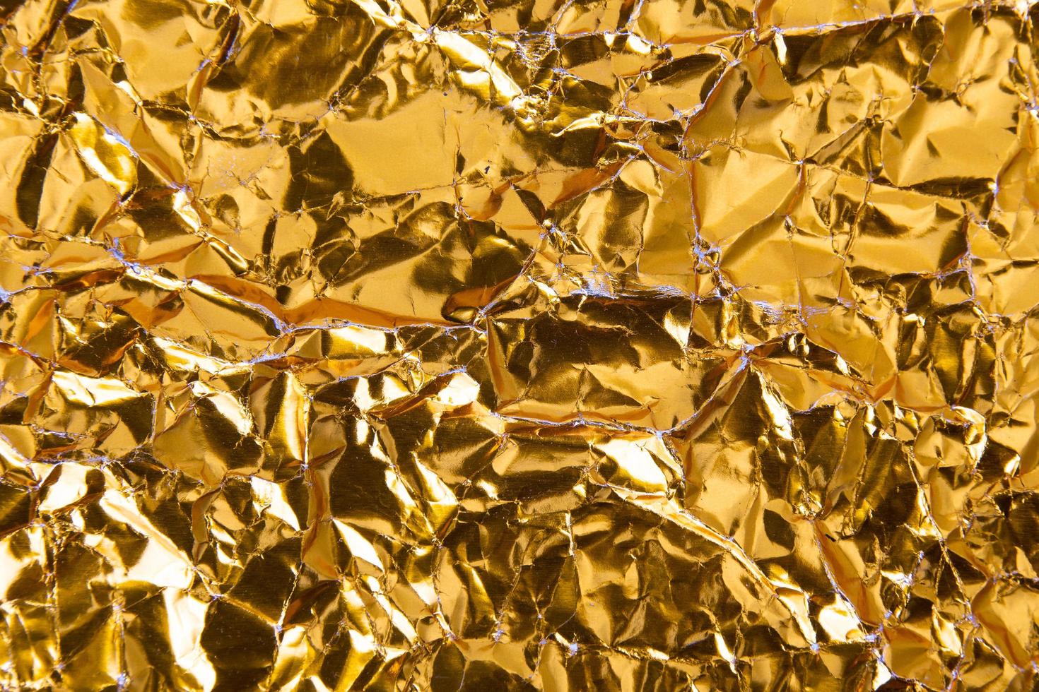 Gold paper crumpled texture background photo