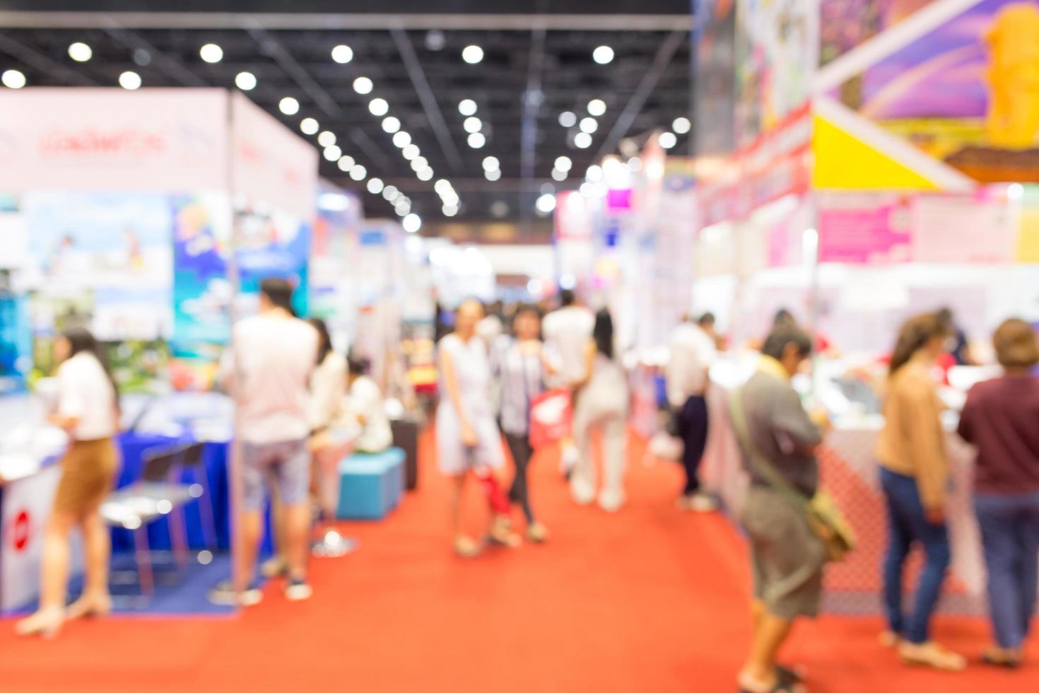 Abstract blurred people in exhibition, expo in hall photo
