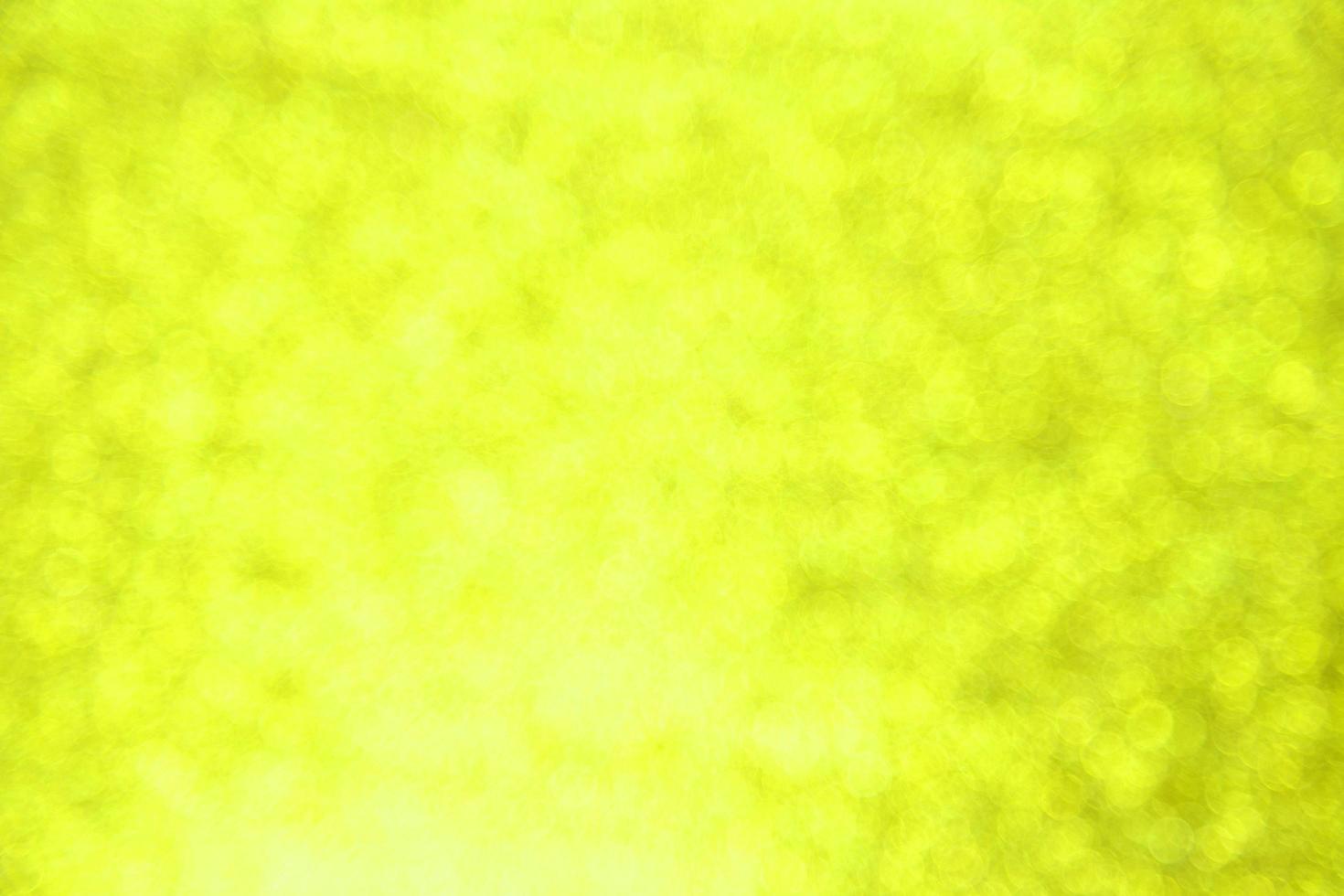 Abstract yellow bokeh background photo