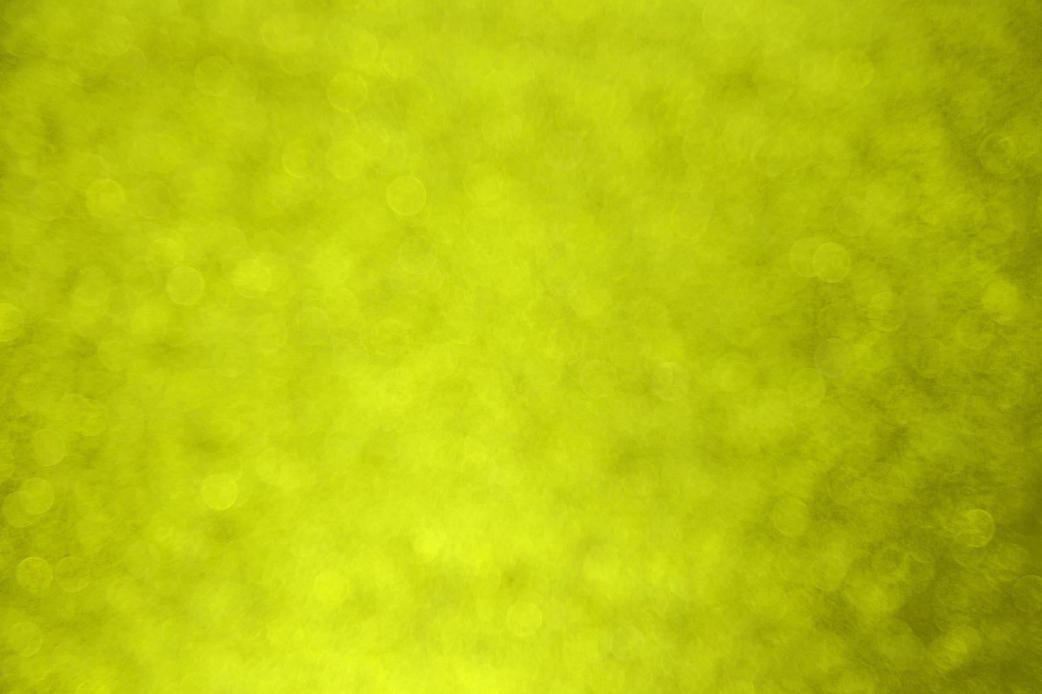 Abstract yellow bokeh background photo