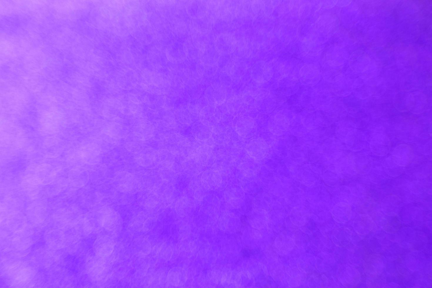 Abstract purple bokeh background photo