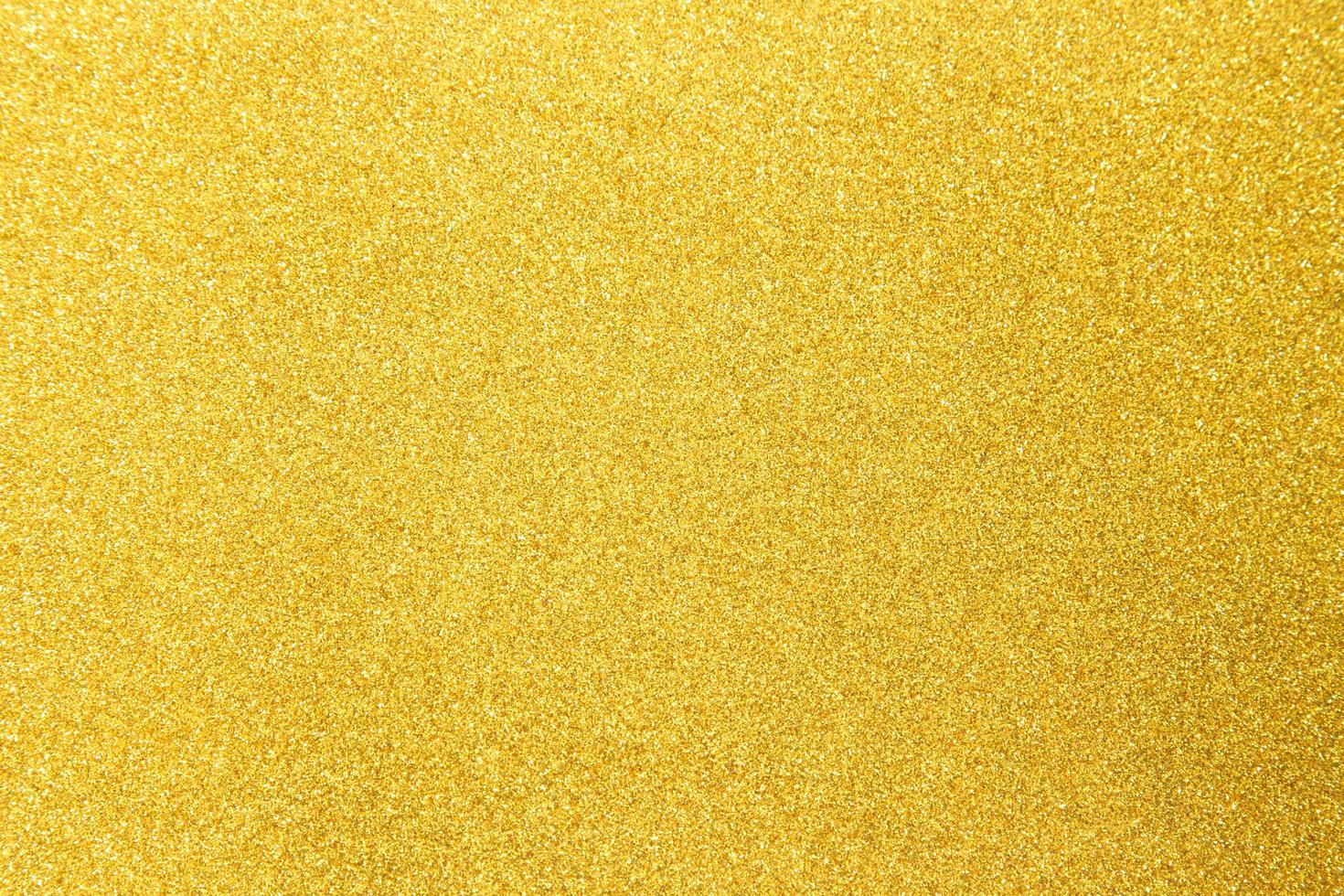 Golden glitter texture background photo