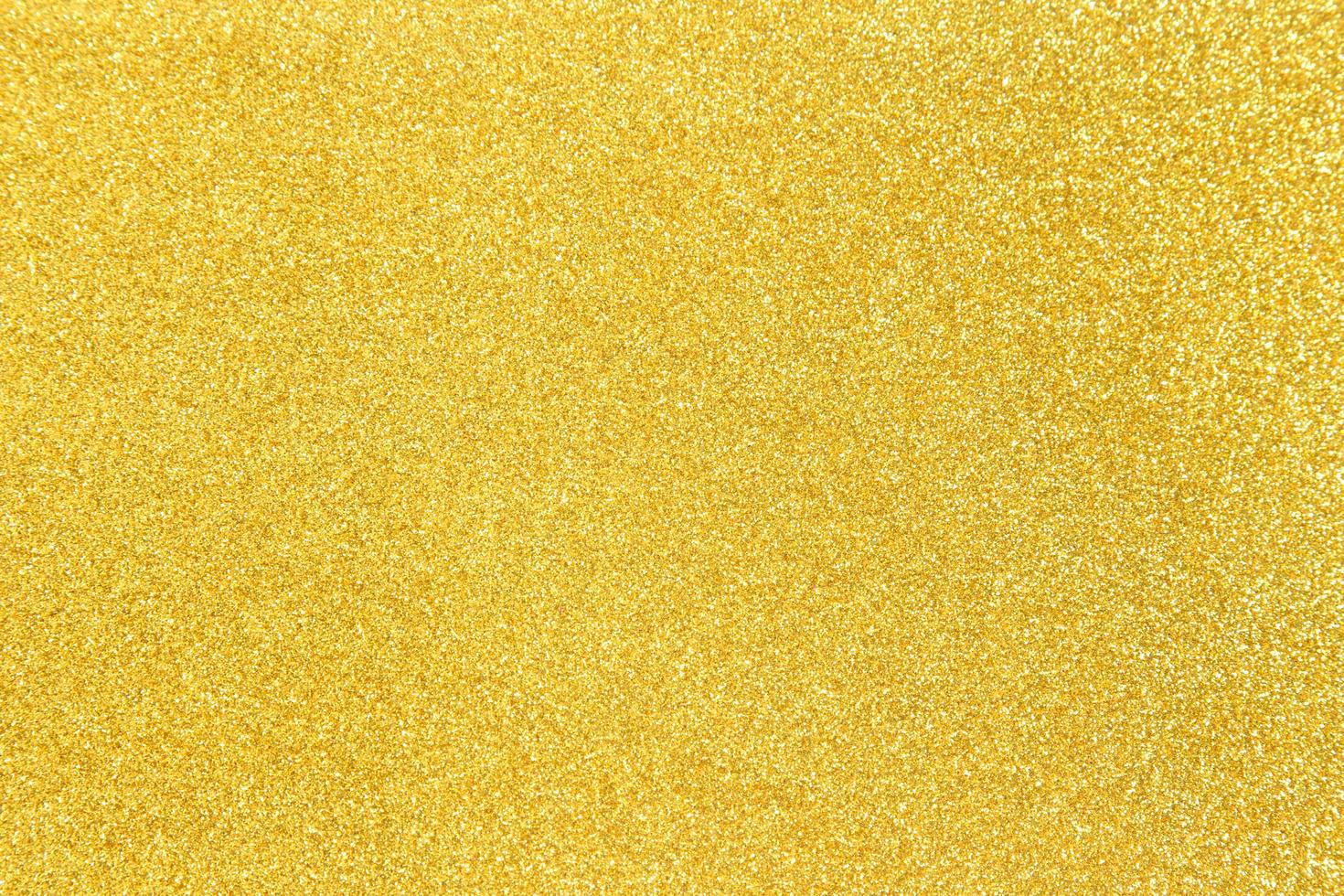 fondo de textura de brillo dorado foto