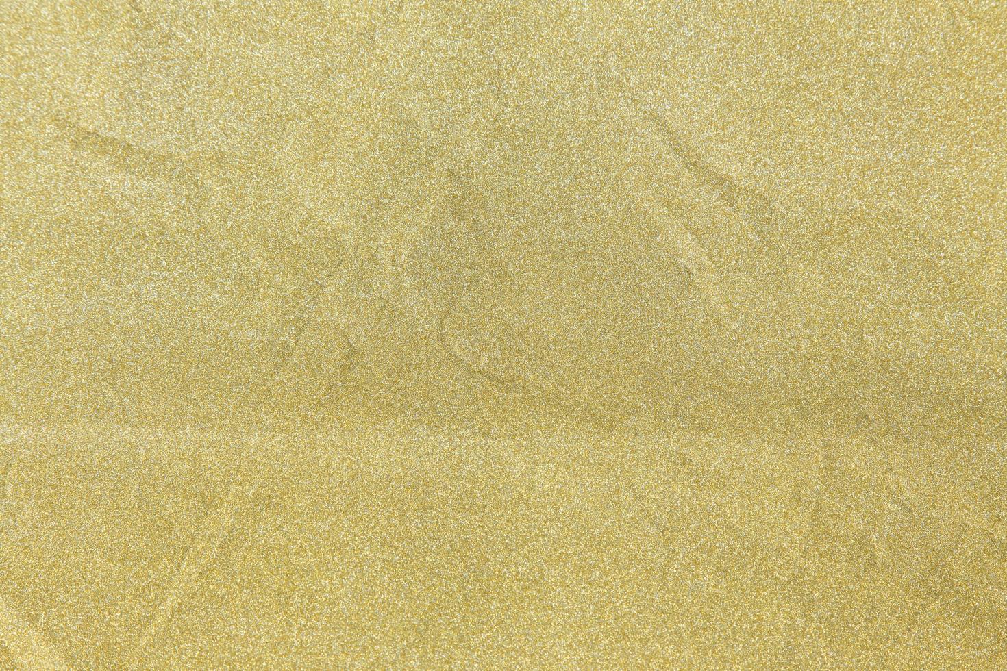Golden glitter texture background photo