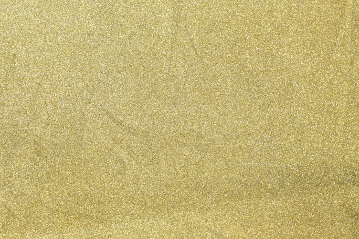Golden glitter texture background photo