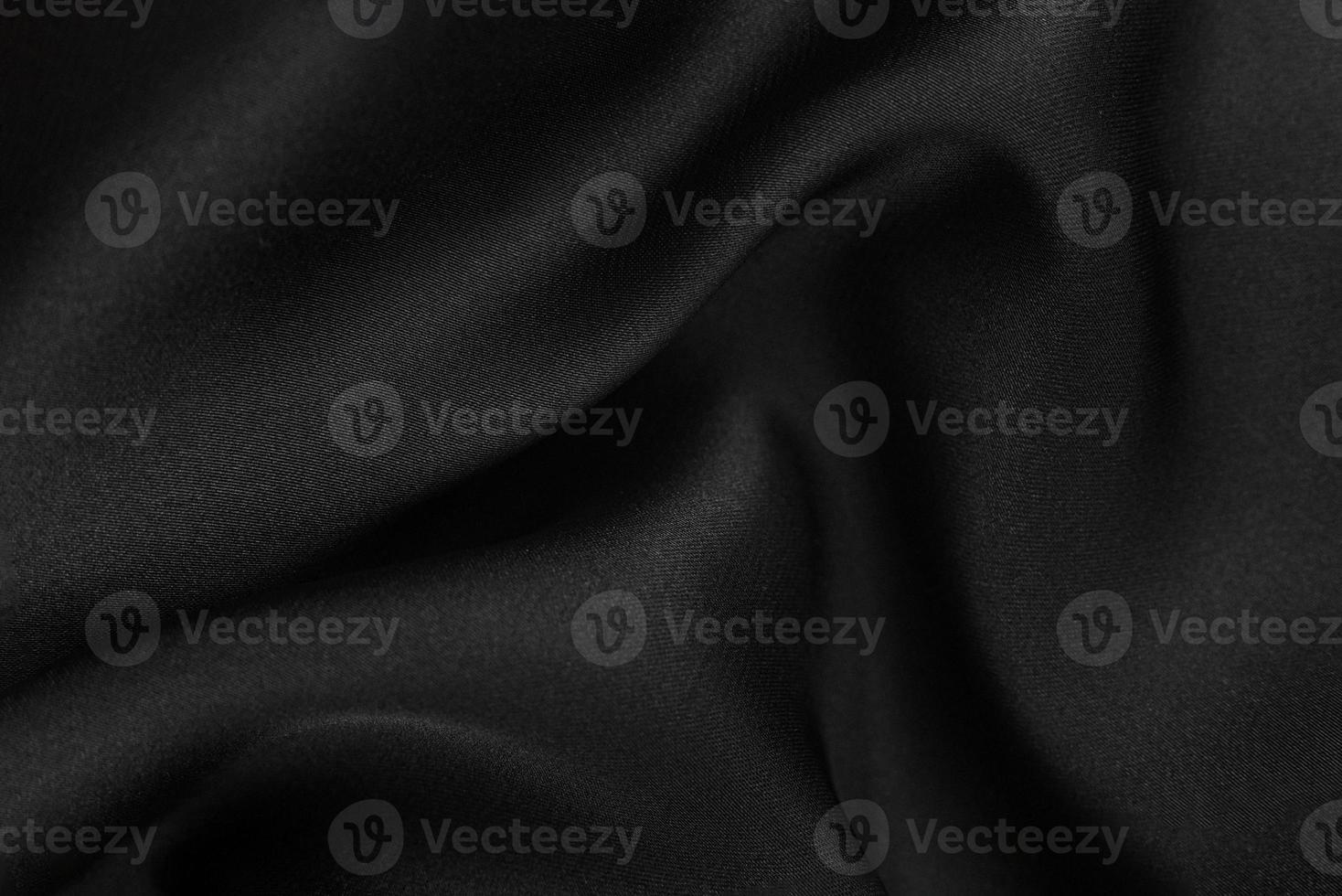 Smooth elegant silk or satin texture can use as abstract background. Luxurious background design photo
