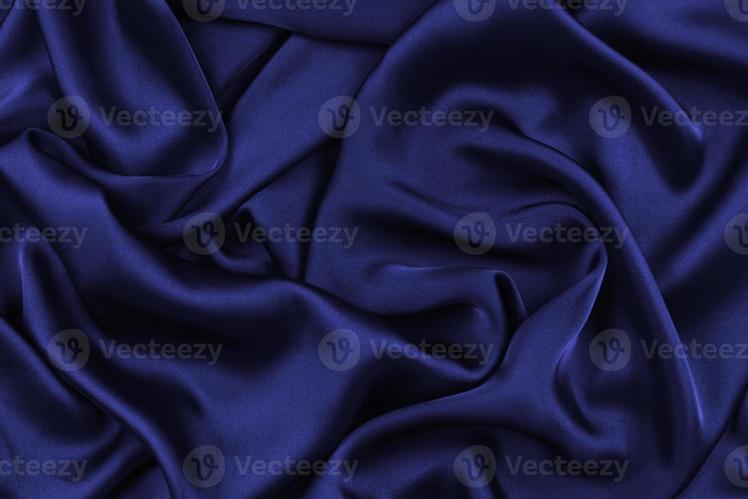 La textura de la tela de seda o satén de lujo se puede utilizar como fondo abstracto. vista superior. foto