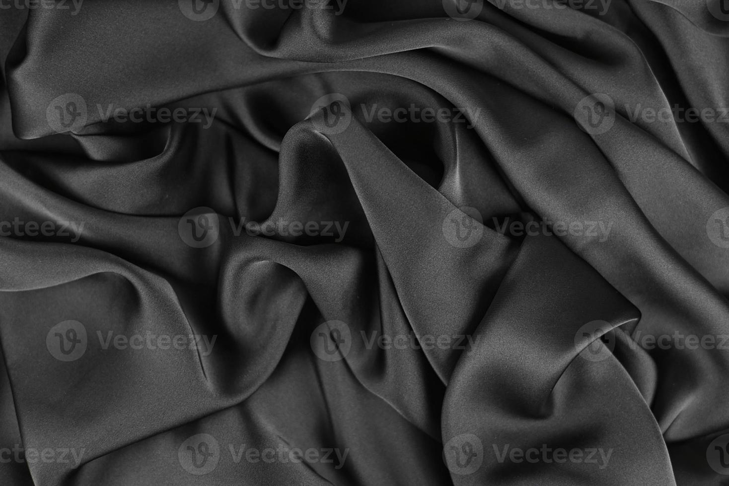 Smooth elegant silk or satin texture can use as abstract background. Luxurious background design photo