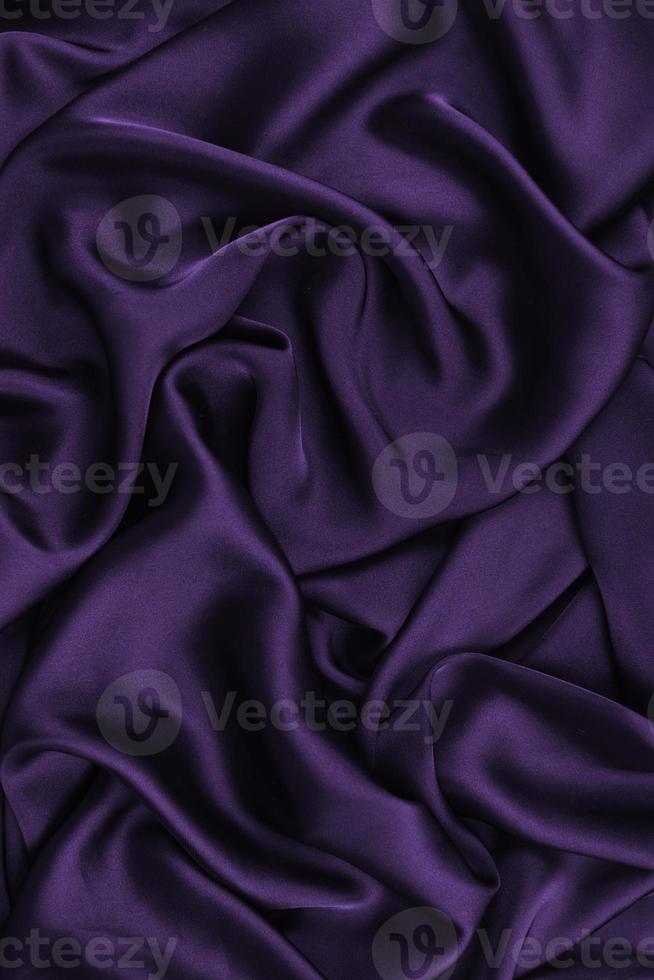 Abstract Satin Silky Cloth,Fabric Textile Drape with Crease Wavy Folds.with soft waves,waving in the wind.Texture of crumpled paper photo