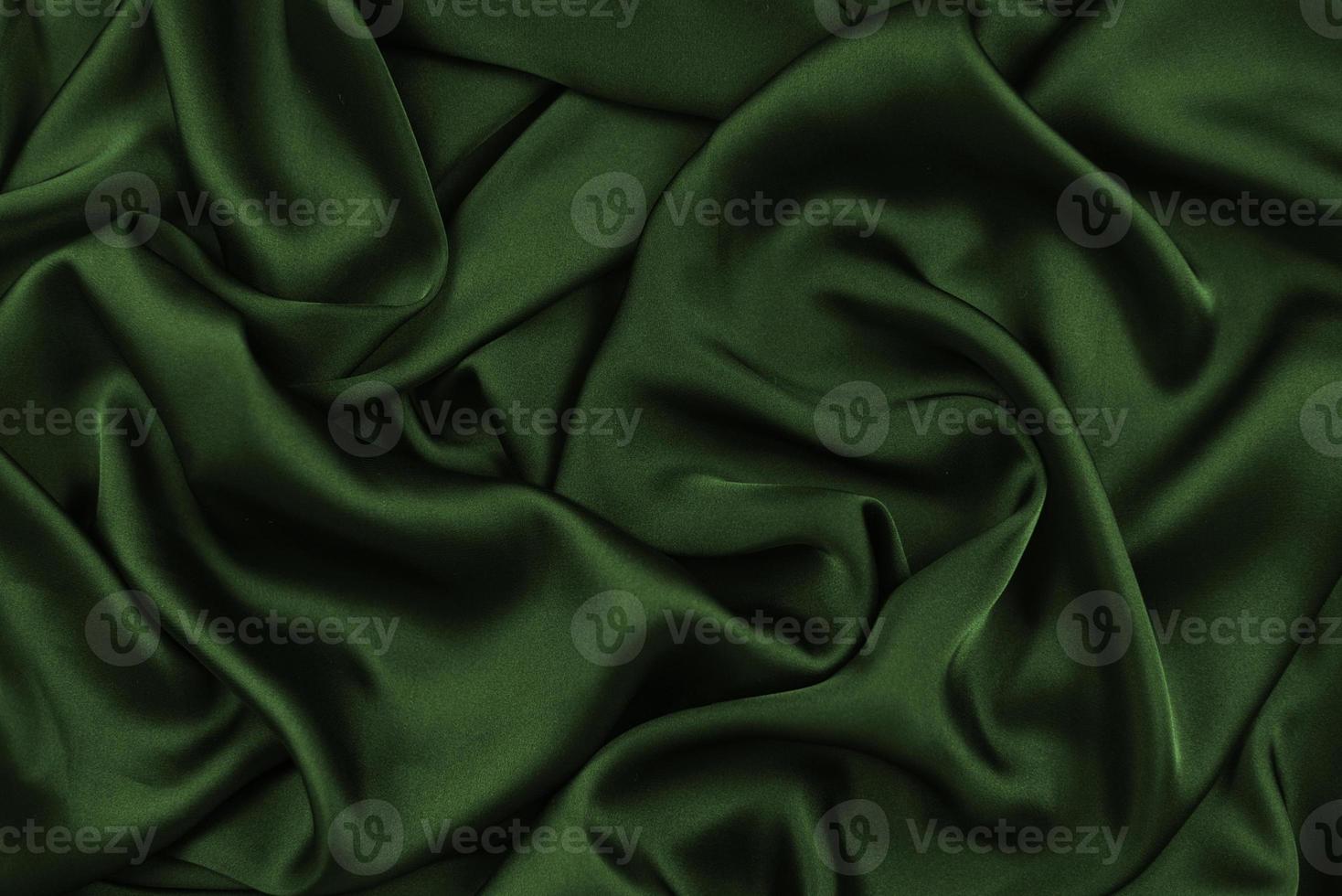 Background fabric. Dark textile fabric with texture and pattern drapery background photo