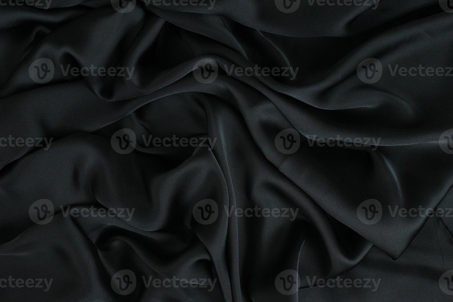 Background fabric. Dark textile fabric with texture and pattern drapery background photo