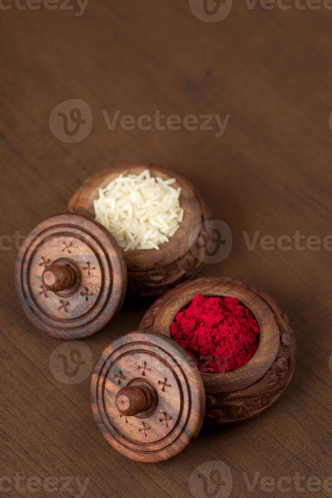 Kumkum and rice grain container. Natural color powders are used while worshipping God and an at auspicious occasions. photo