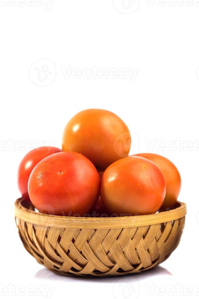 Fresh tomatoes on white background. photo