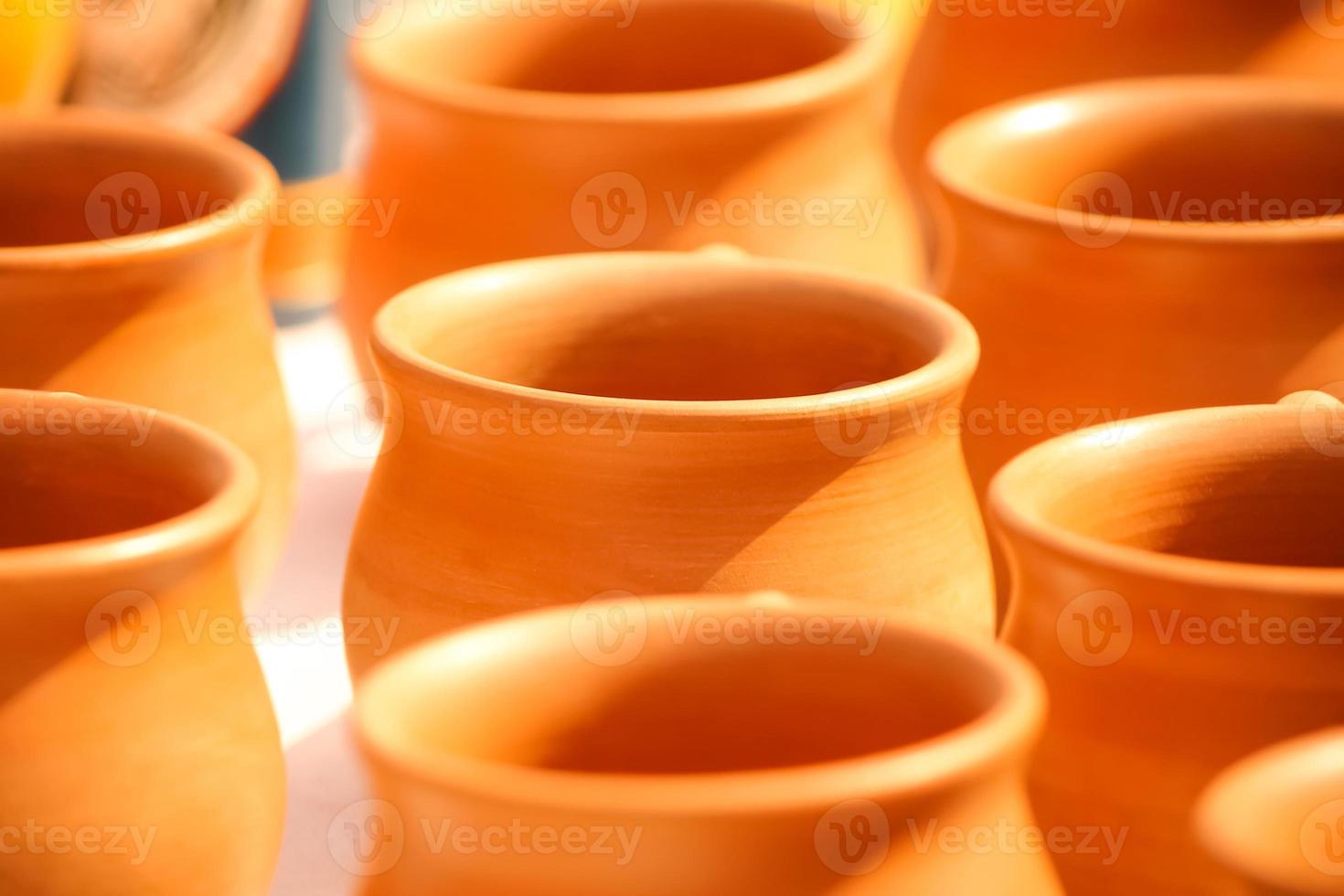 Kulhar - Brown Earthen cups in a row photo