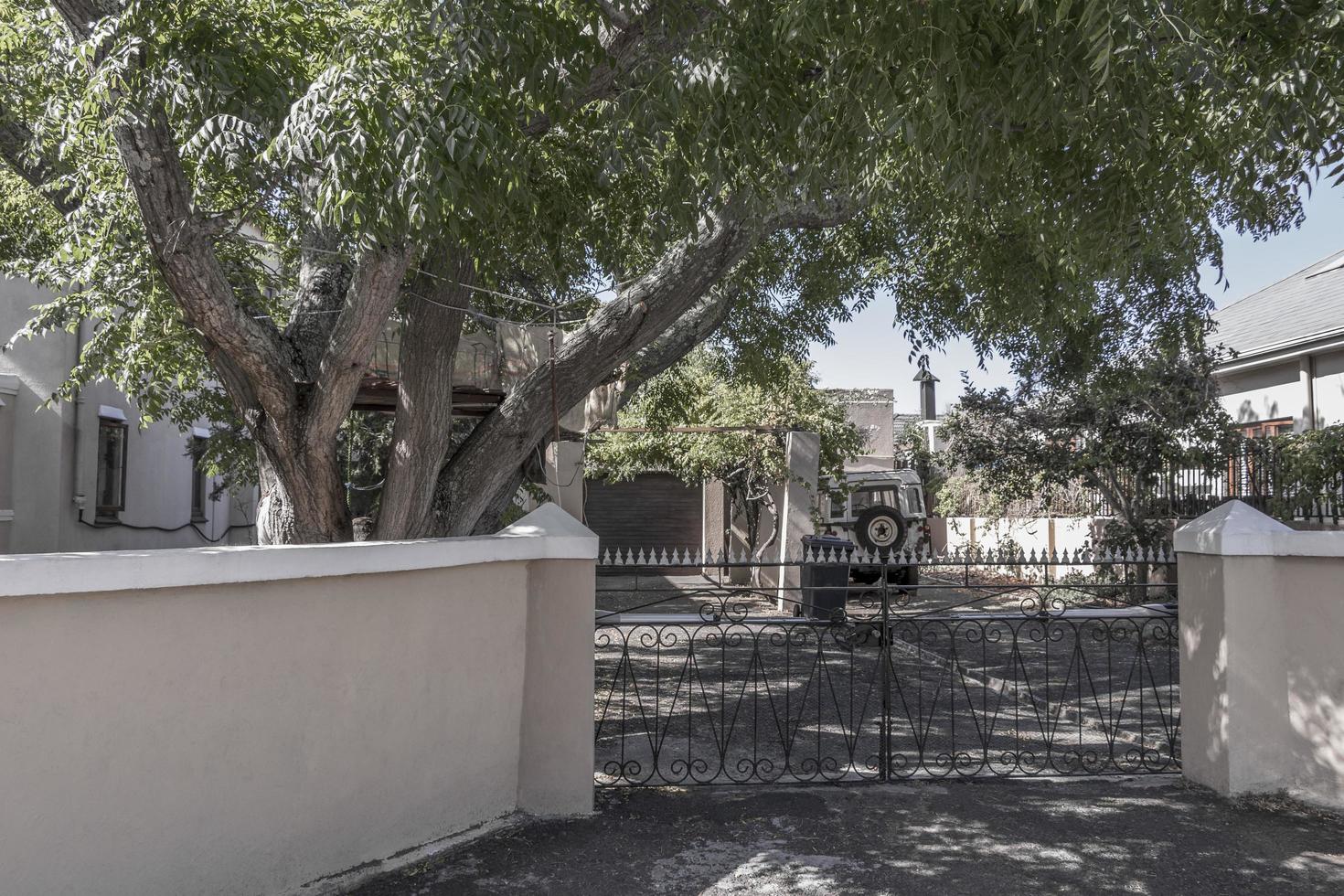 Cottage with garden and fences in Cape Town, South Africa. photo