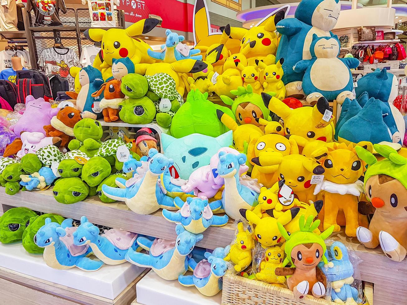 Colorful Pokemon Pikachu plush toys in Bangkok airport Thailand. photo