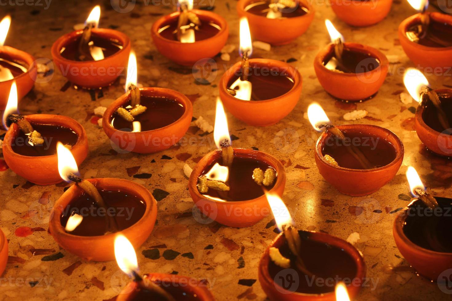 Oil lamps in row, festival season photo