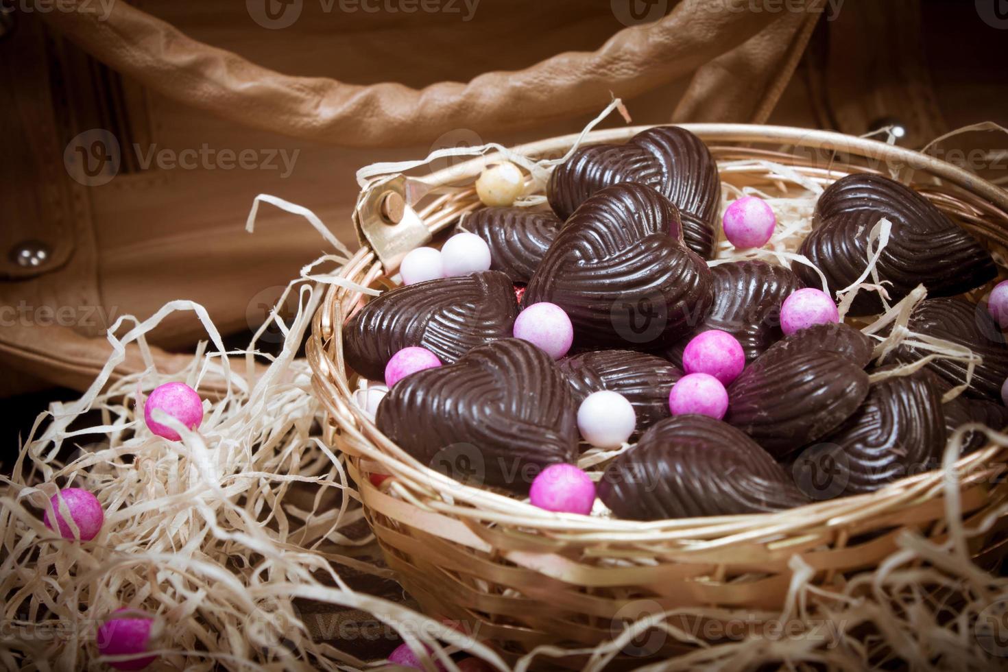 Home made chocolates in a basket photo