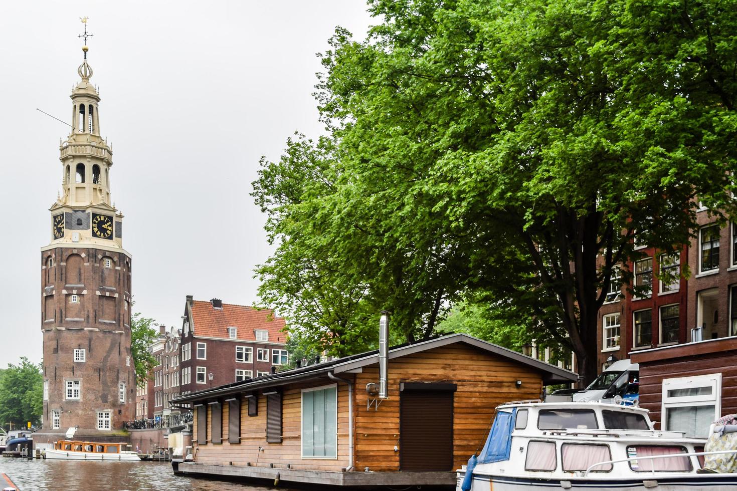 Water level view from one of the canals of Amsterdam, The Netherlands, 2016 photo
