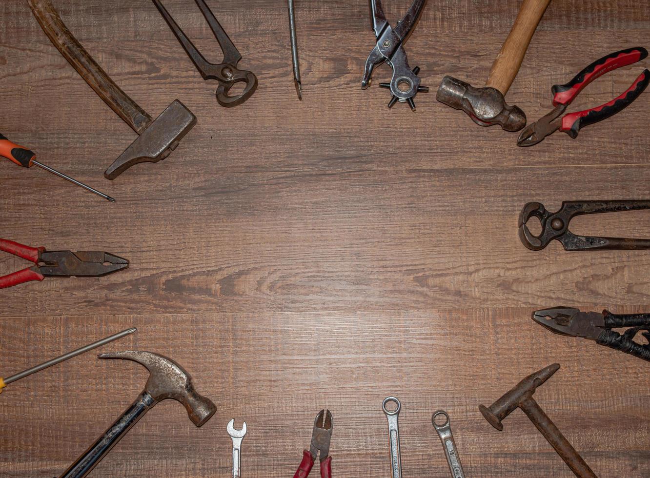 Tools on a wooden background photo