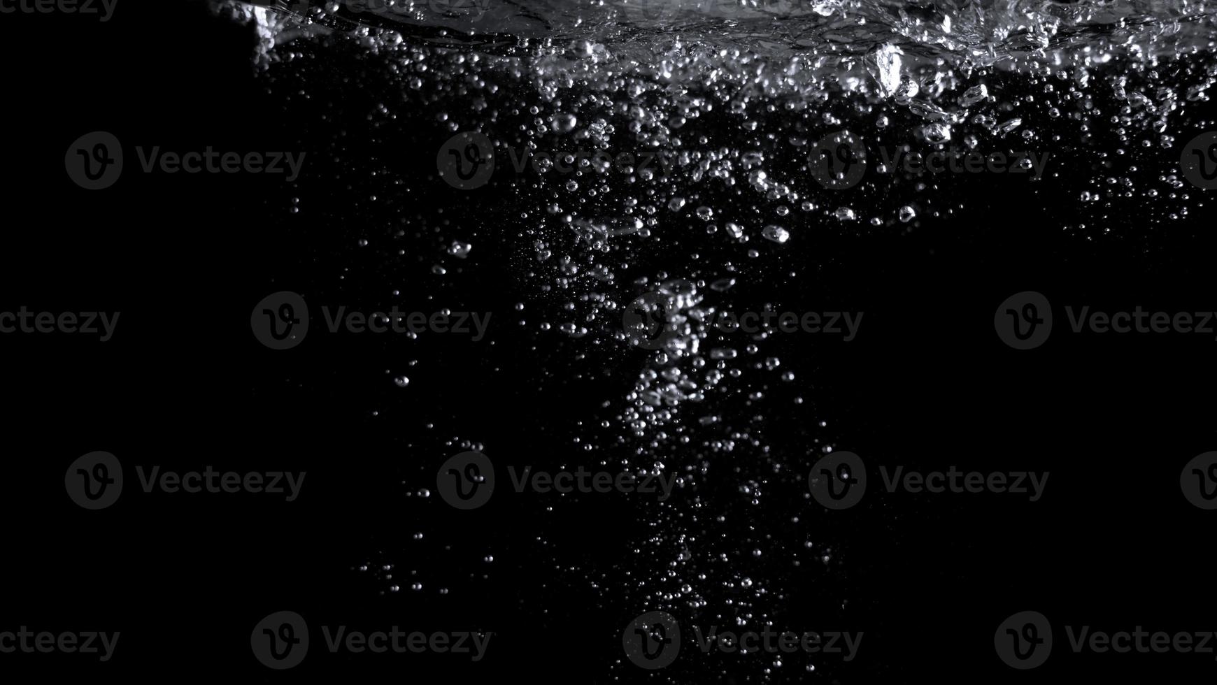 Blurry images of real soda bubbles floating and splashing up photo