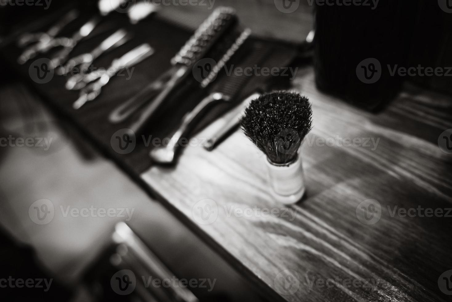 the tools of a Barber on the desktop in front of the mirror photo