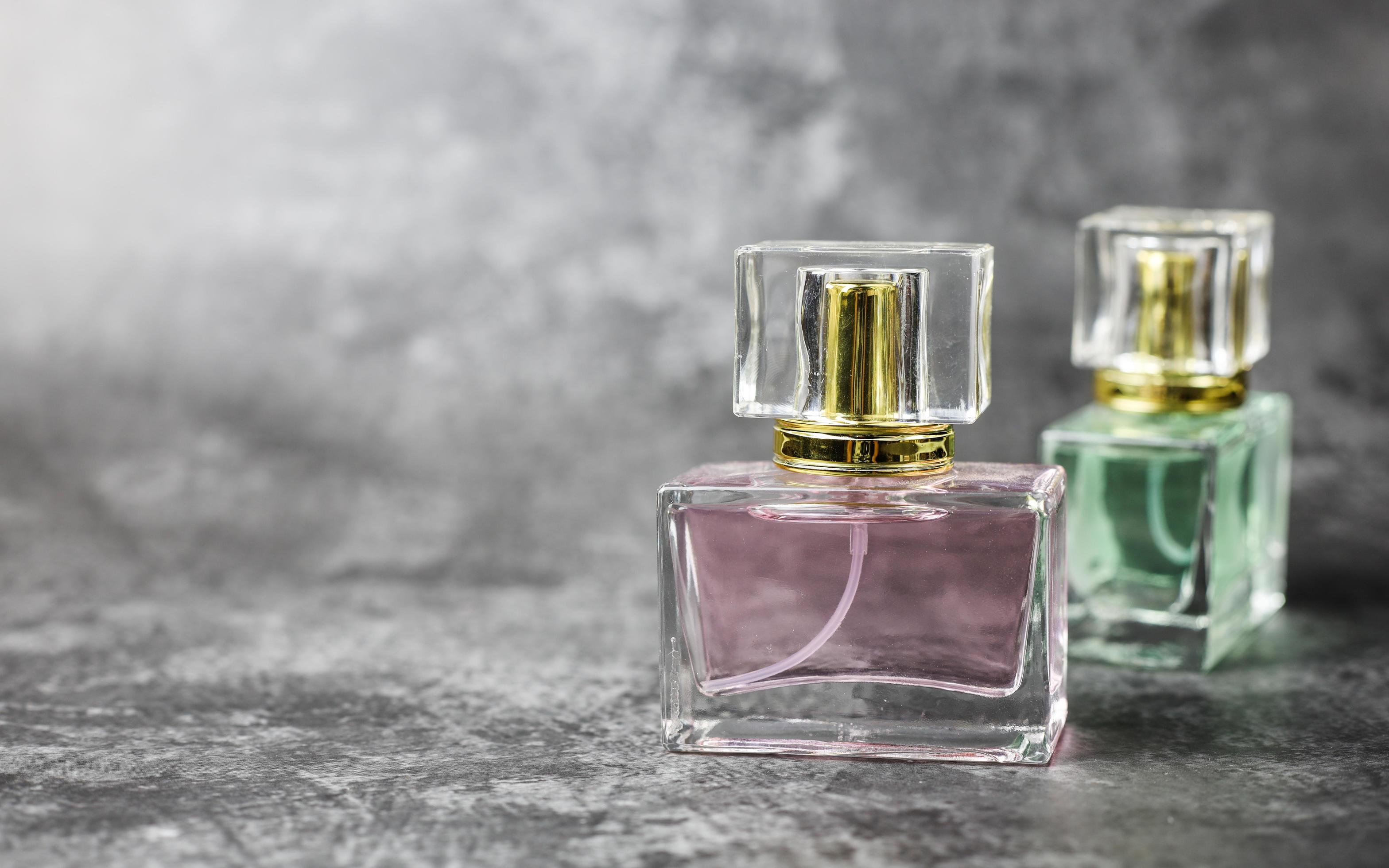 Perfume bottle on a black background 2907844 Stock Photo at Vecteezy