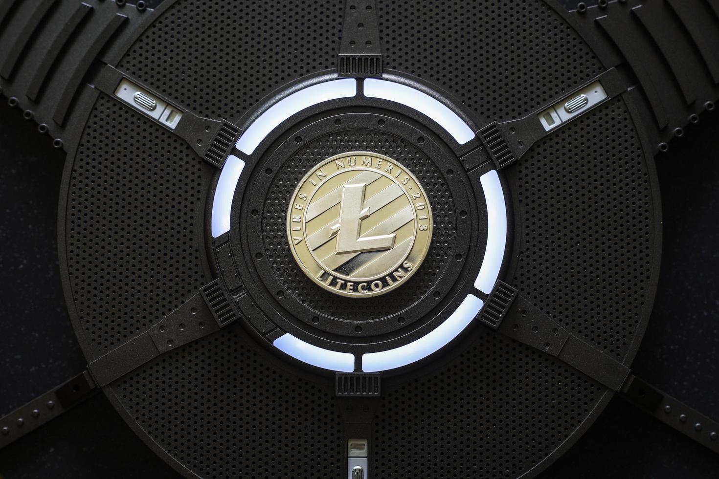 Litecoin Cryptocurrency coin on a PC computer graphic card photo