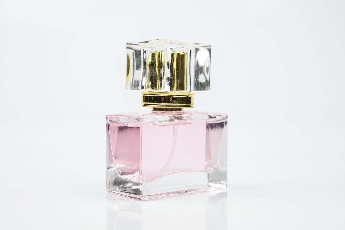 Perfume bottle on white background photo