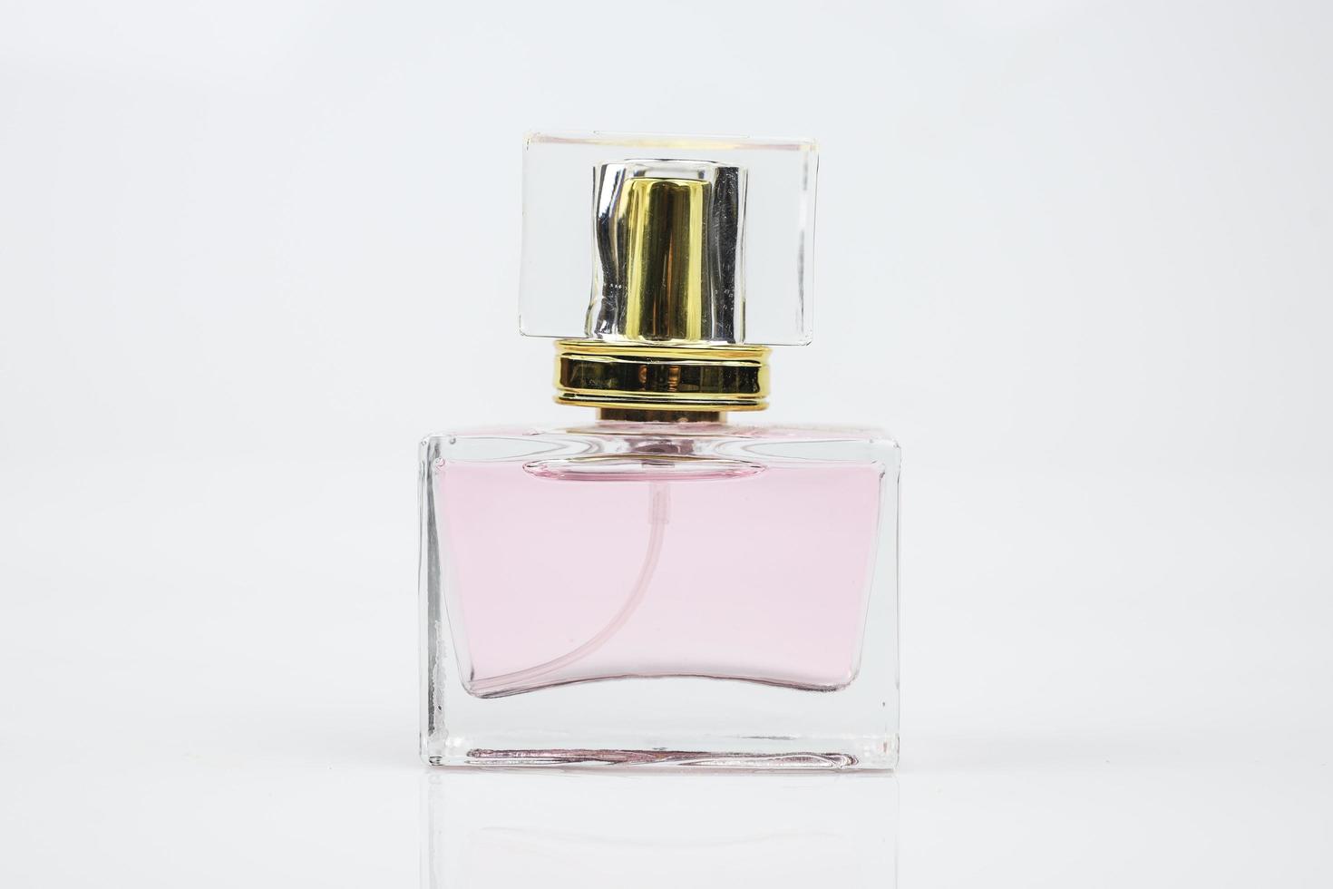 Perfume bottle on white background photo