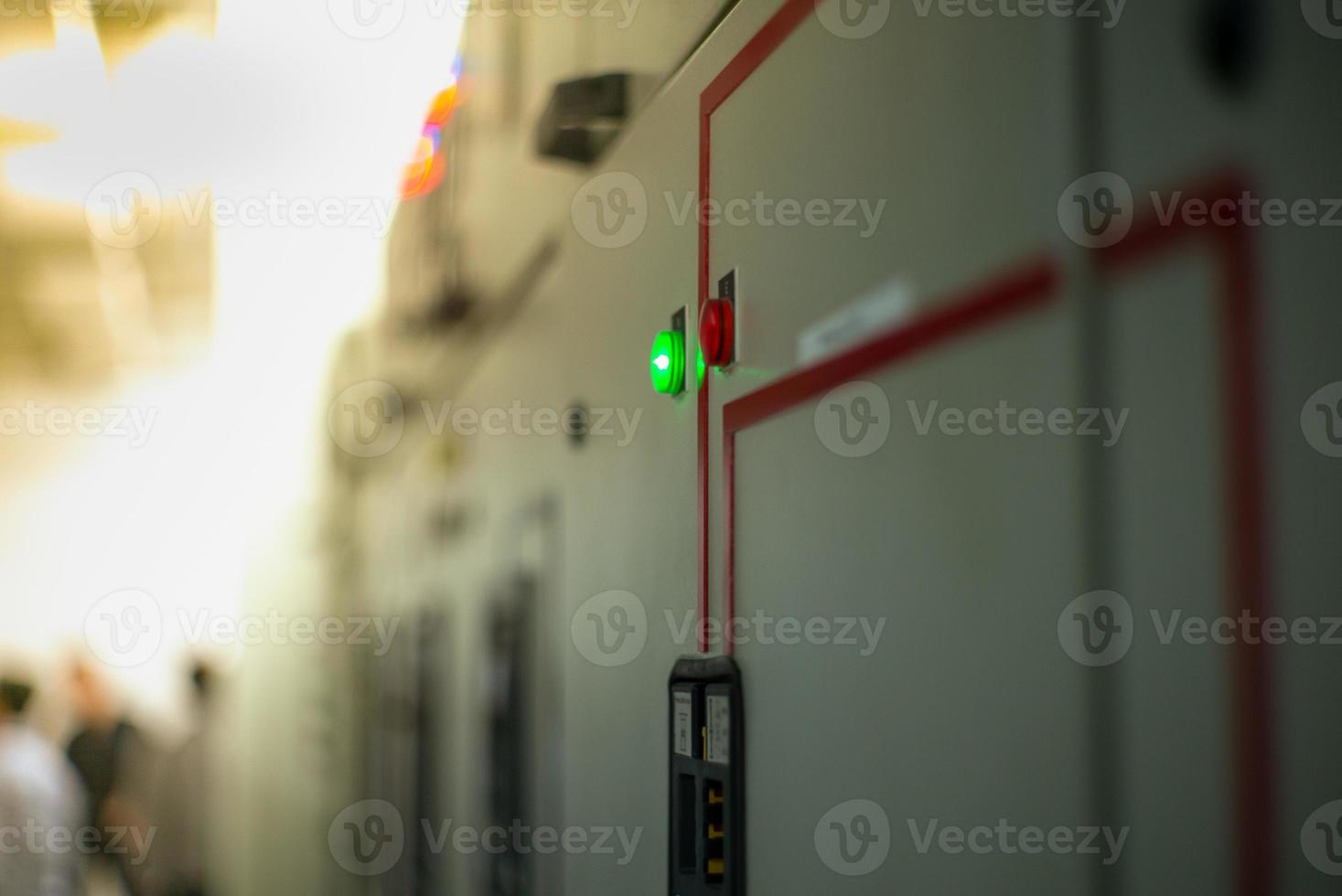 Closeup lighting indicator on the control carbinet in the electrical room photo