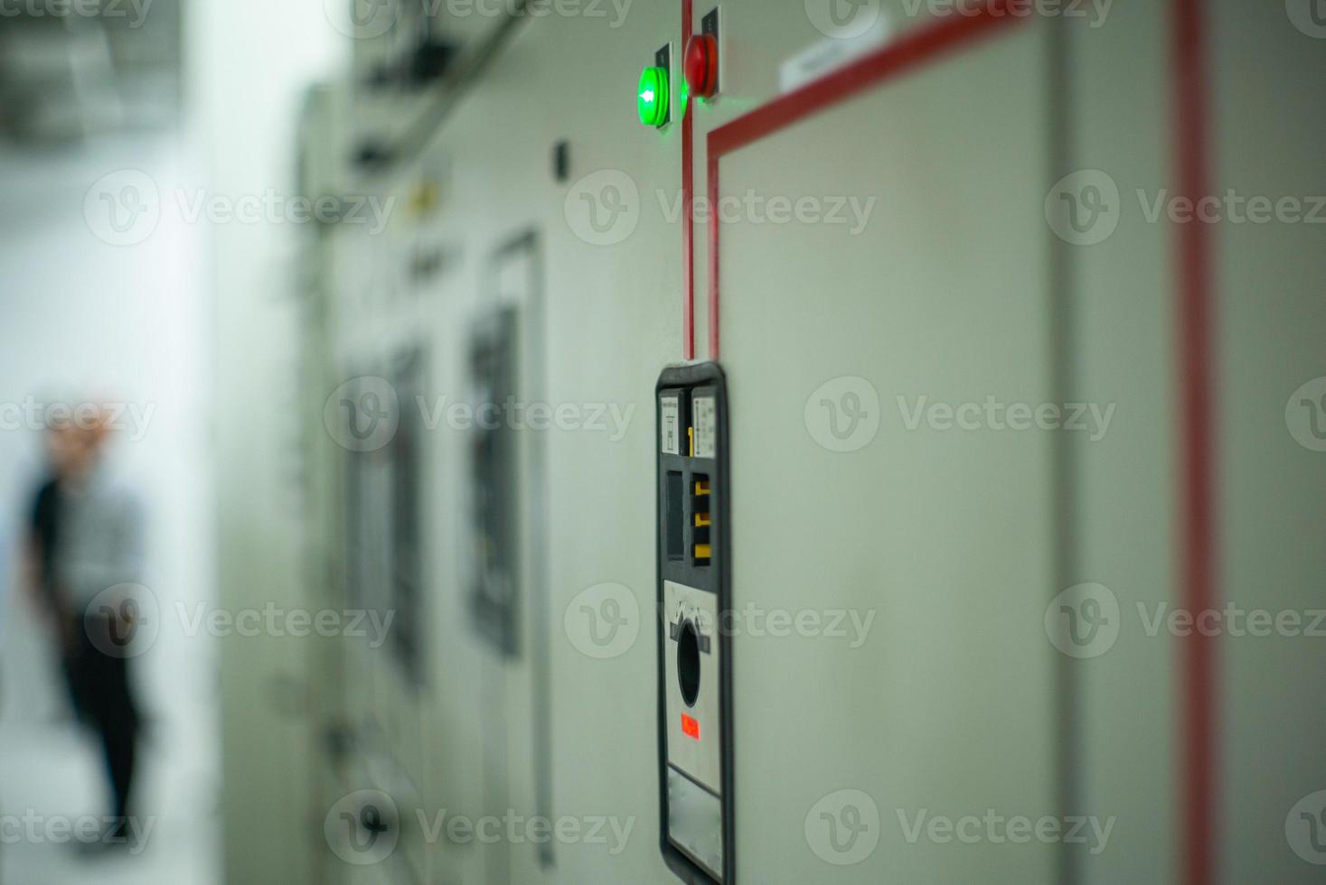 Closeup lighting indicator on the control carbinet in the electrical room photo
