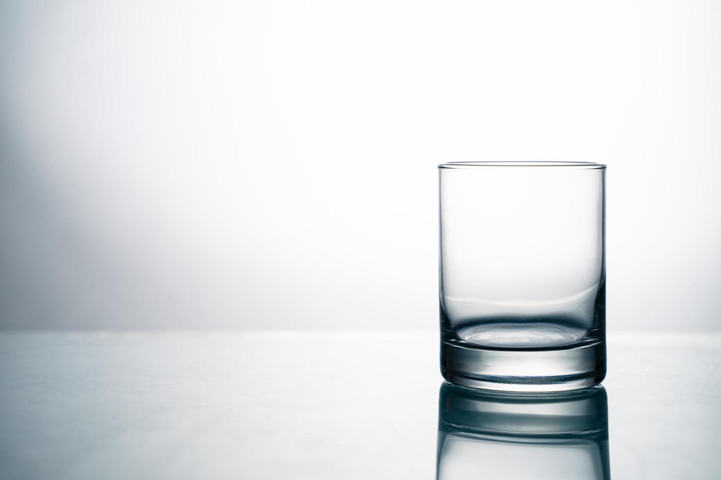 Close up of crystal clear glass on the table. photo