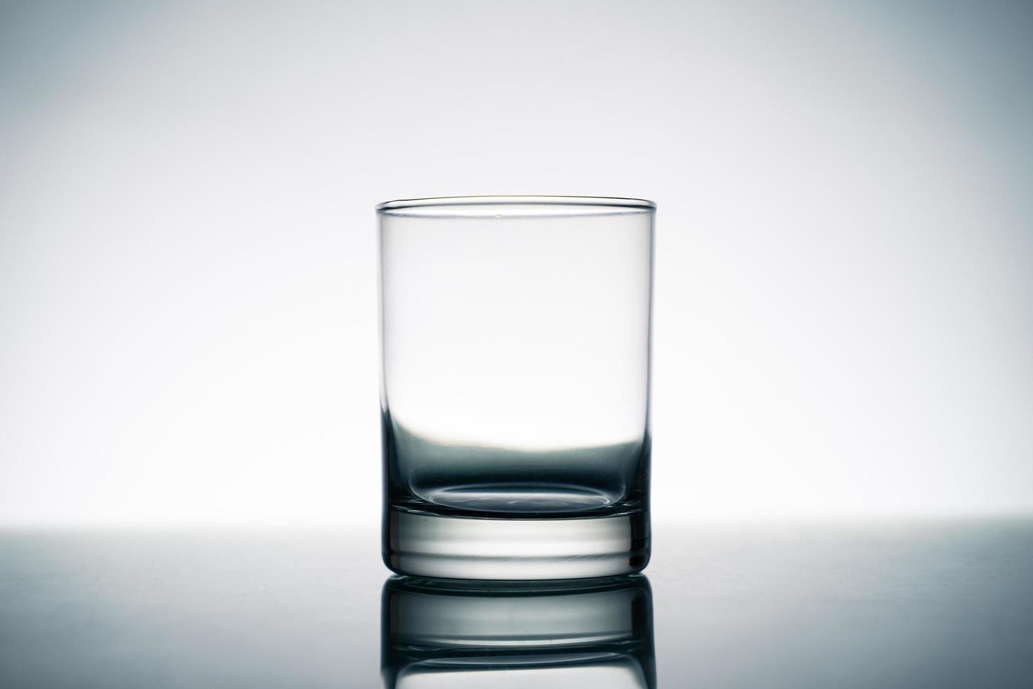 Close up of crystal clear glass on the table. photo