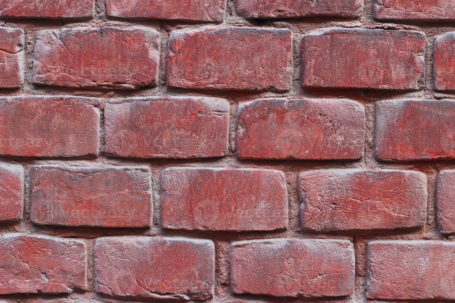 Red old brick wall. Interesting texture or background. photo