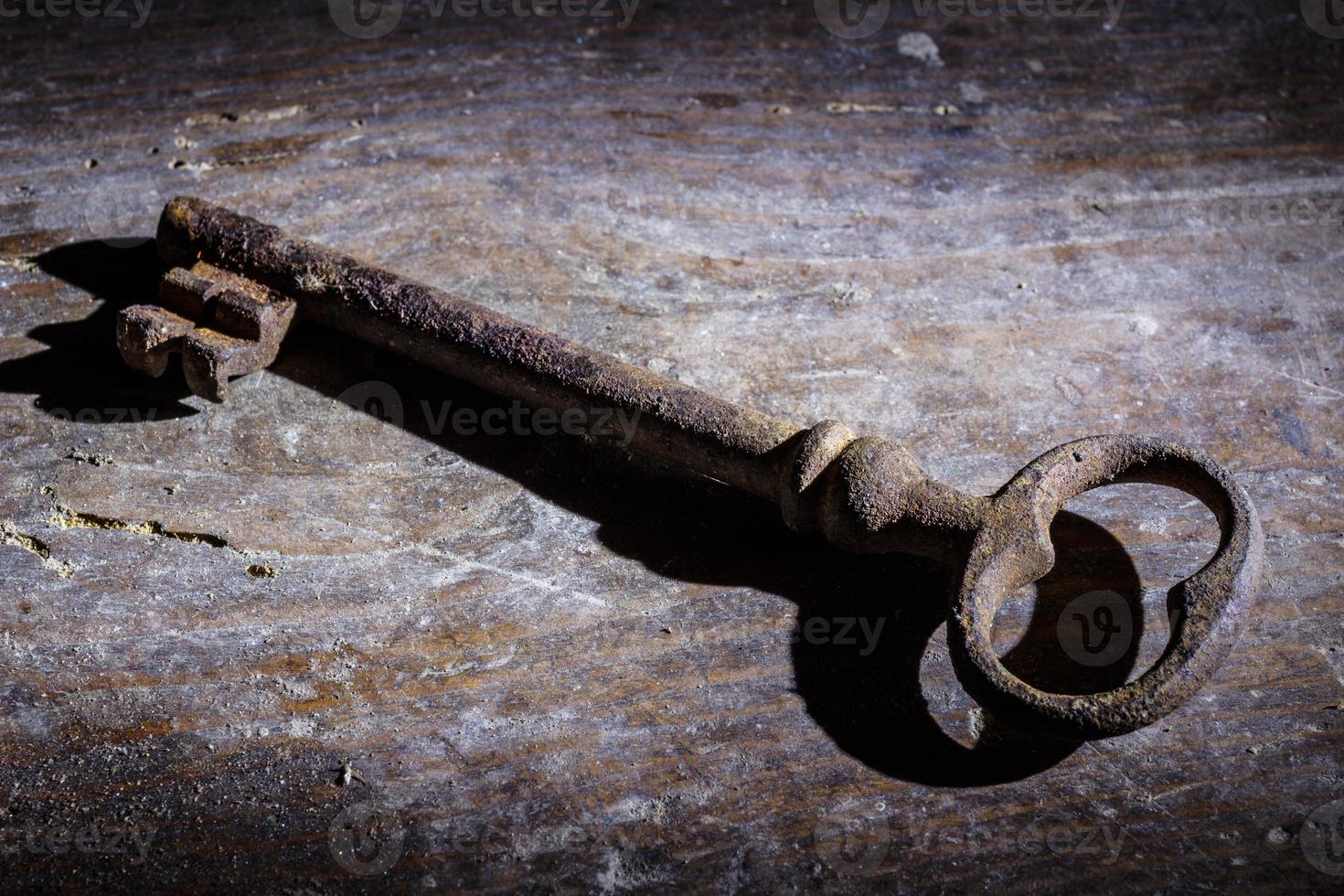 Old metal and rusty key photo